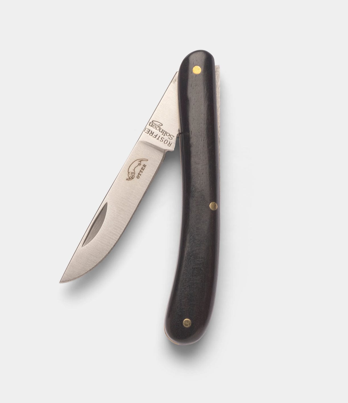 The Best Made Co Little Doctor Knife is a folding pocket knife featuring a stainless steel blade, partially open, with a dark wooden handle and brass rivets—an ideal everyday folder—displayed on a light gray background.