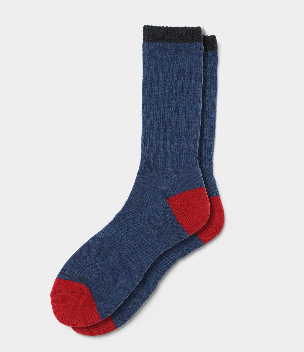 The Best Made Co Standard Wool Sock, in blue with red toes and heels and black cuffs, made in the USA, is shown on a white background—ideal for daily wear.