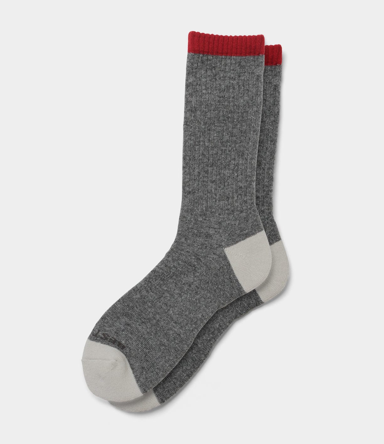 The Best Made Co Standard Wool Sock is a pair of gray ribbed merino wool socks with cream toes and heels and red cuffs, designed for everyday wear, shown laid flat on a white background.