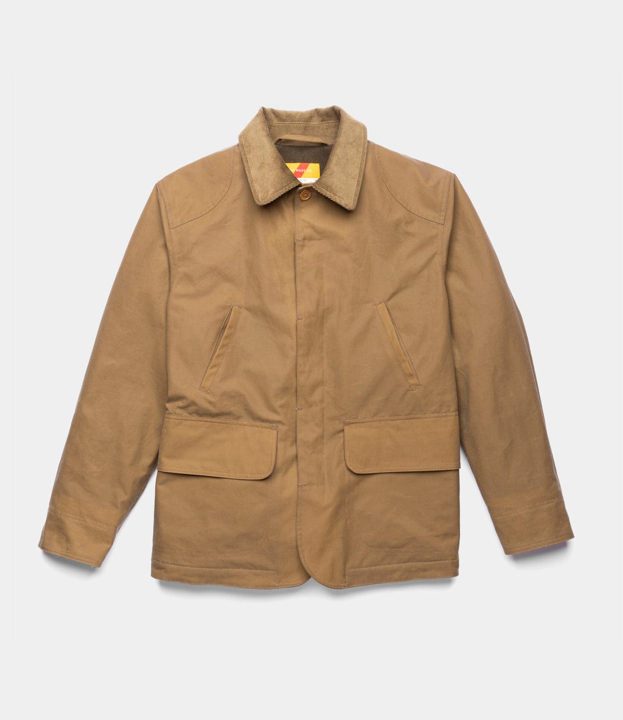 The Best Made Co. Wool-Lined Waxed Field Jacket Tan, featuring long sleeves, corduroy collar, slanted chest pockets, and large front flap pockets, is displayed flat on a white background for a classic, weather-resistant look.