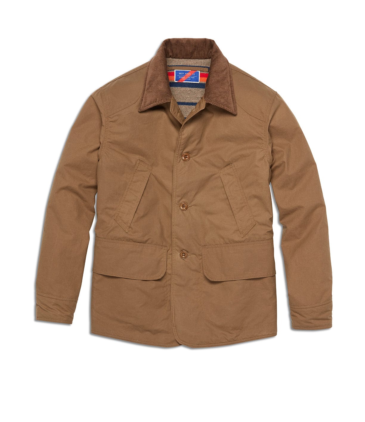 Best Made Co.'s Wool-lined Waxed Field Jacket Tan features a button front, corduroy collar, two large flap pockets, long sleeves, and a visible wool lining with a colorful design—perfect tailored all-weather outerwear.