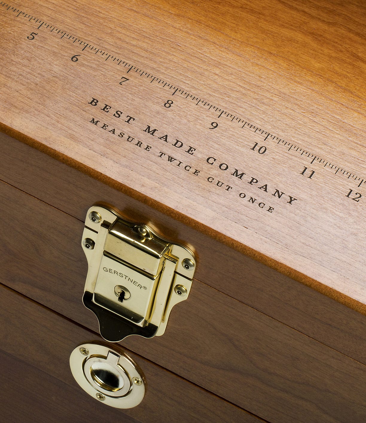 The Best Made Co. 41D Gerstner Chest 2026 features a brass latch and lock, a lid engraved with a ruler, and the text “BEST MADE COMPANY, MEASURE TWICE, CUT ONCE.”.