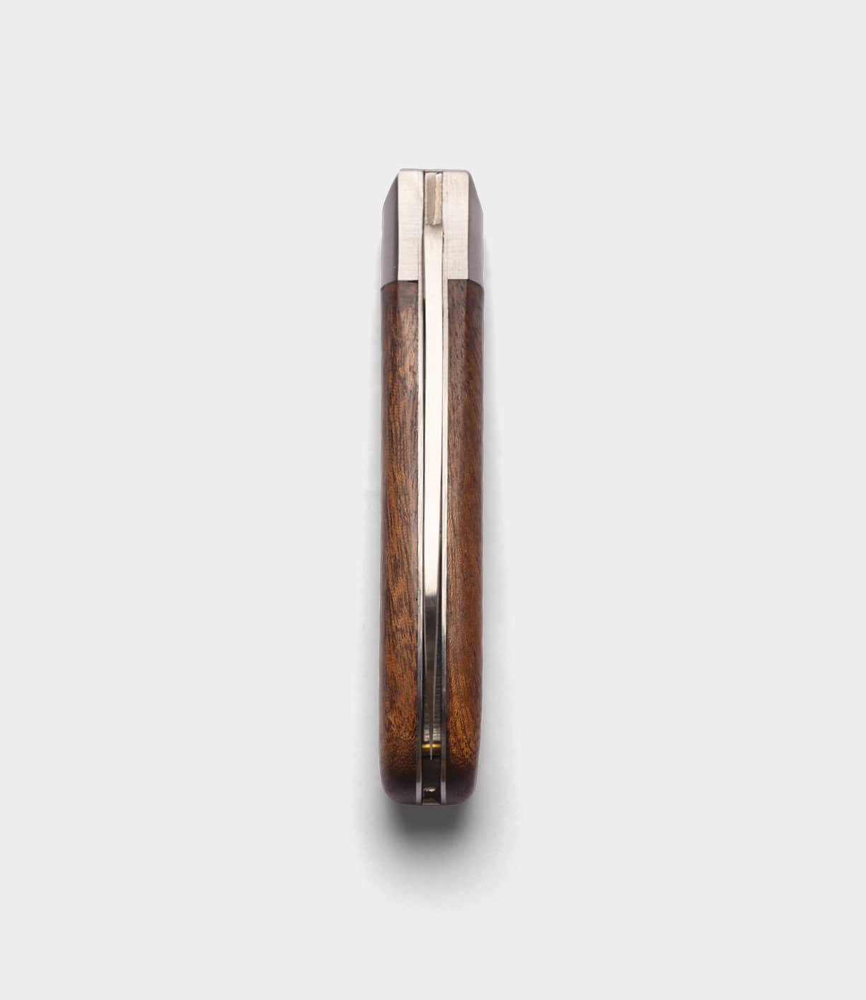 The Best Made Co. Anchor Knife, a closed folding nautical knife with a wooden handle, metal spine, and sheepsfoot blade, is shown upright against a plain white background.