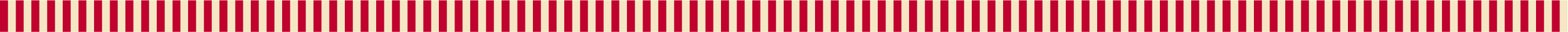 A pattern of evenly spaced vertical red and white stripes fills the entire image, creating a bold, repetitive design.