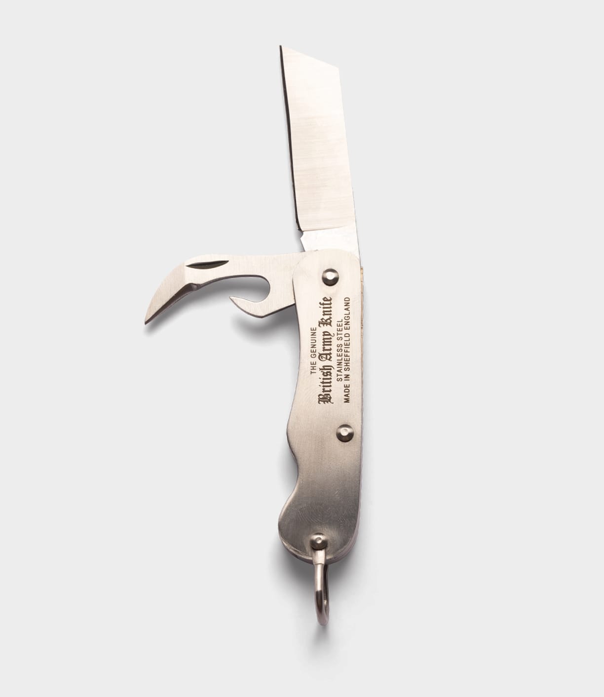 The Best Made Co. British Army Knife, made in Sheffield, features a stainless steel straight blade, curved marlinspike, and engraved handle text, shown against a plain light gray background.