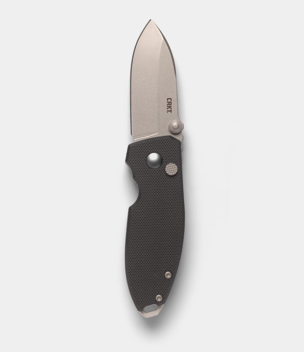 A partially open CRKT Squid by Best Made Co., featuring a short, wide D2 steel blade with CRKT branding and a textured black folding handle.