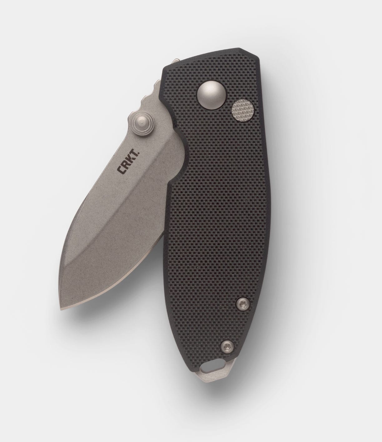 A CRKT Squid knife by Best Made Co with a partially open D2 steel blade and a textured black handle, viewed from above on a white background. The blade features the CRKT engraving.