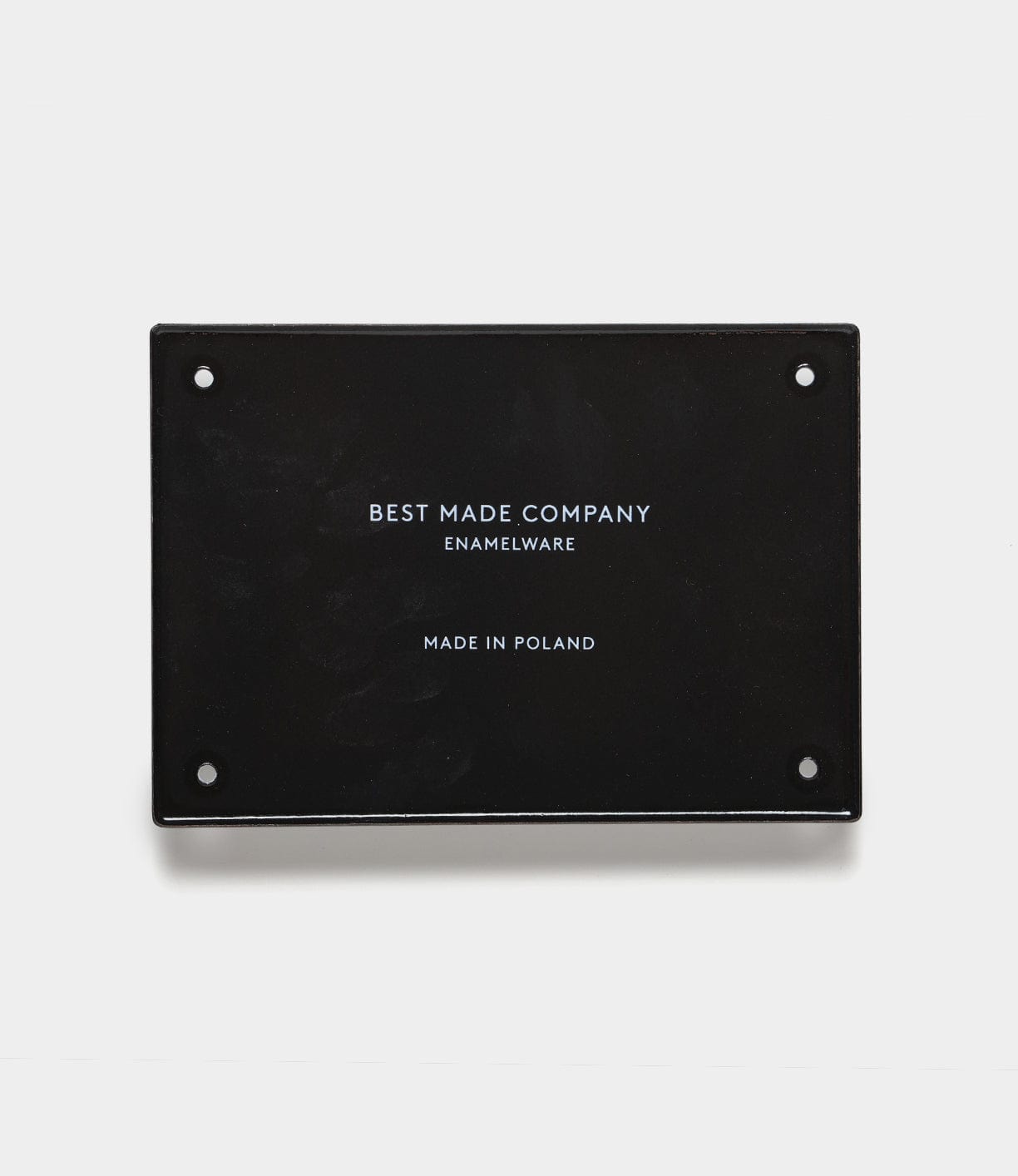 A rectangular black enamel steel sign by Best Made Company Co., styled like an enamel plate with four corner holes. Features "Stay Sharp" (kanji edition) in white, making it a unique inspirational gift for any occasion.