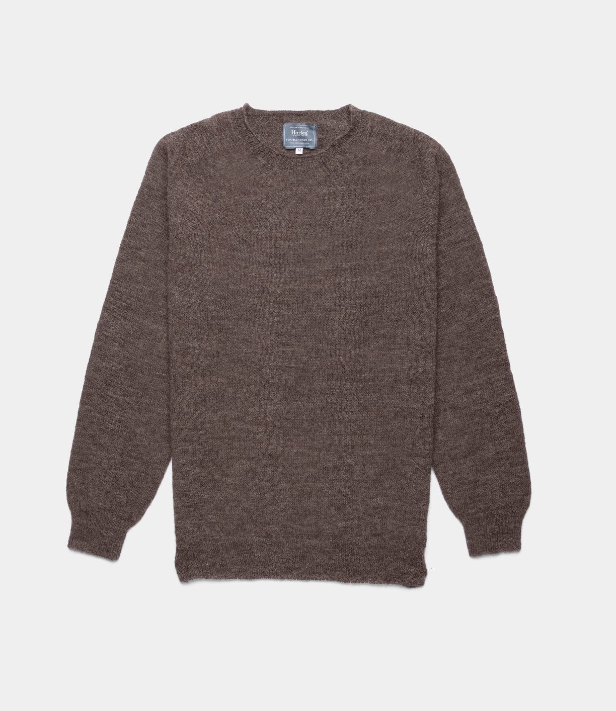The Best Made Co. 5-Gauge Shetland Sweater in brown, featuring long sleeves and a crew neck for lightweight warmth, is displayed flat against a white background.
