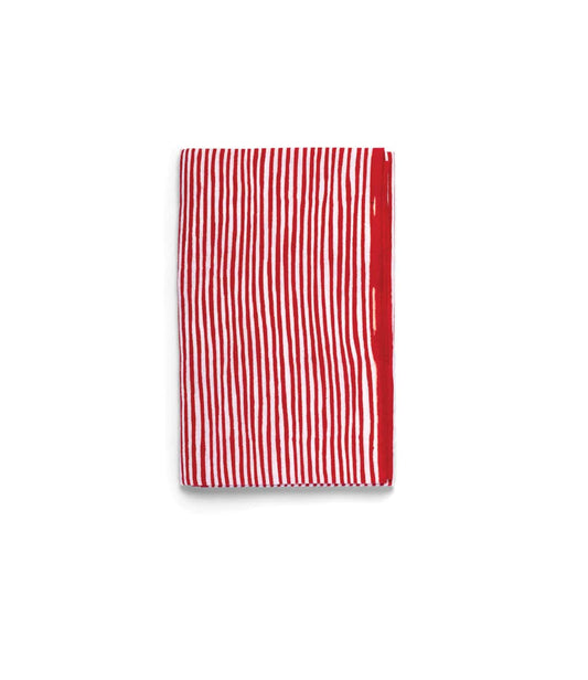 The Yoroke-Jima Tenugui by Best Made Co. features vertical red and white stripes on a plain white background, hand-dyed using the traditional Japanese chusen technique.