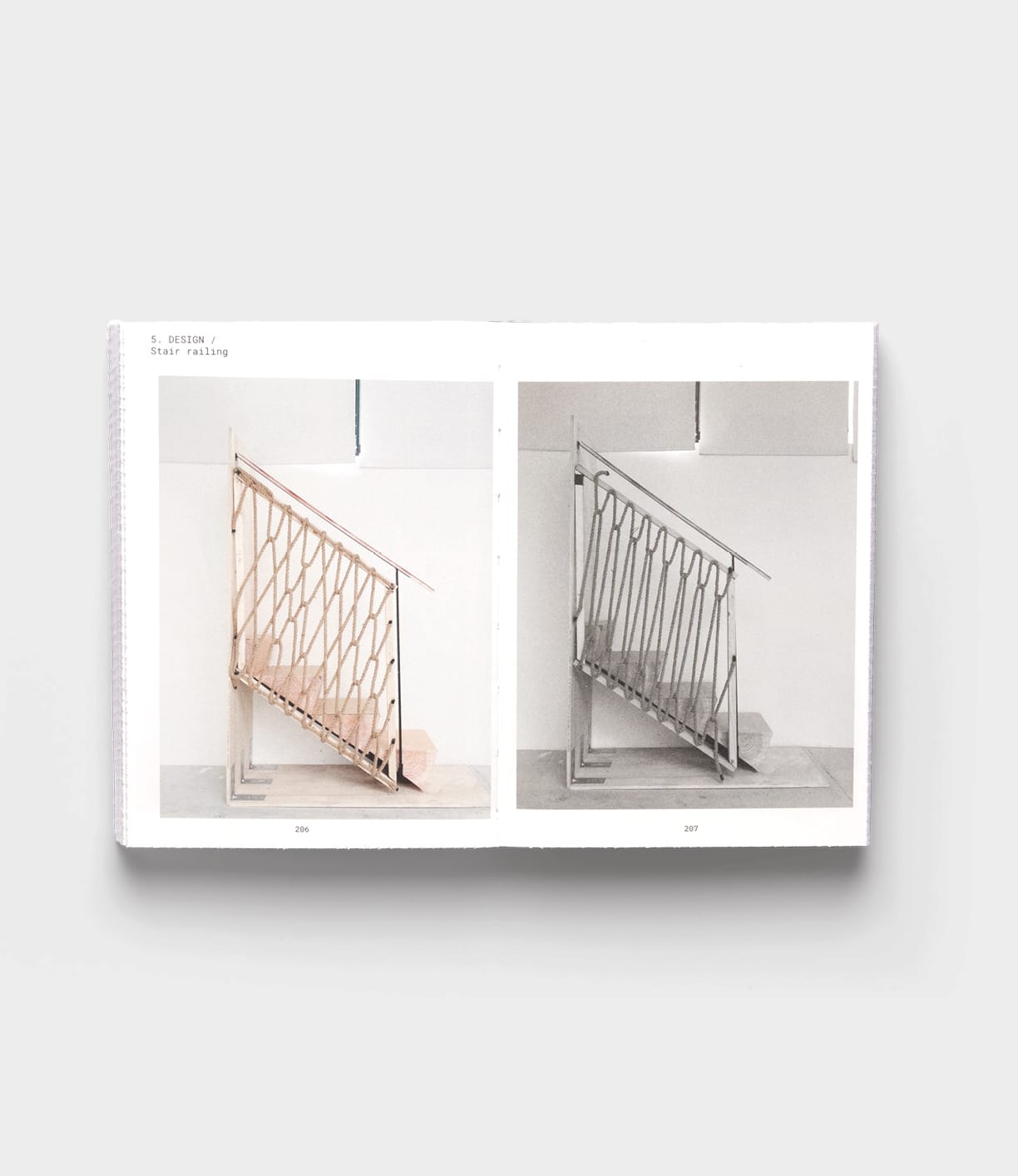 An open book shows two photos of Tane Garden House by Best Made Co., featuring a staircase with a crisscrossed rope railing—one photo is color, the other black and white—both set against white walls, highlighting sustainable design.
