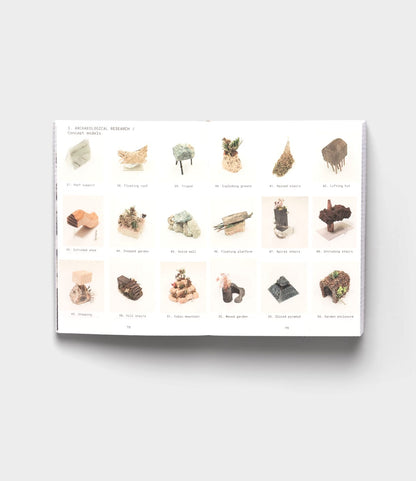 An open book shows a grid of 20 small architectural models, including Tane Garden House by Best Made Co., on a white background, reflecting the innovative spirit of sustainable architecture found in Vitra Design Museum exhibits.