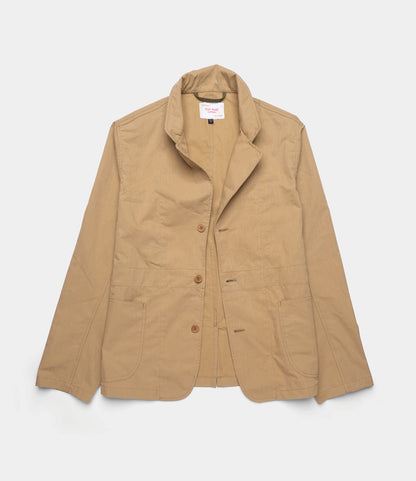 The Best Made Co. Possibilities Jacket Tan is a light brown Japanese cotton casual jacket with a notched collar, three buttons, and two large front pockets, shown laid flat on a plain white background.