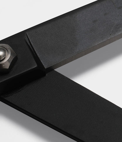 Close-up of the sharp blade and pivot screw of Best Made Co. Kevlar Shears, shown against a plain white background.